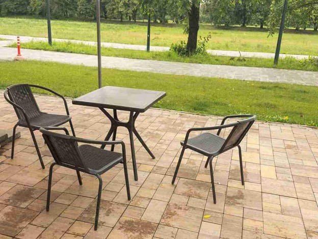 Completed concrete patio with outdoor seating area and clean paver layout in Medina, OH